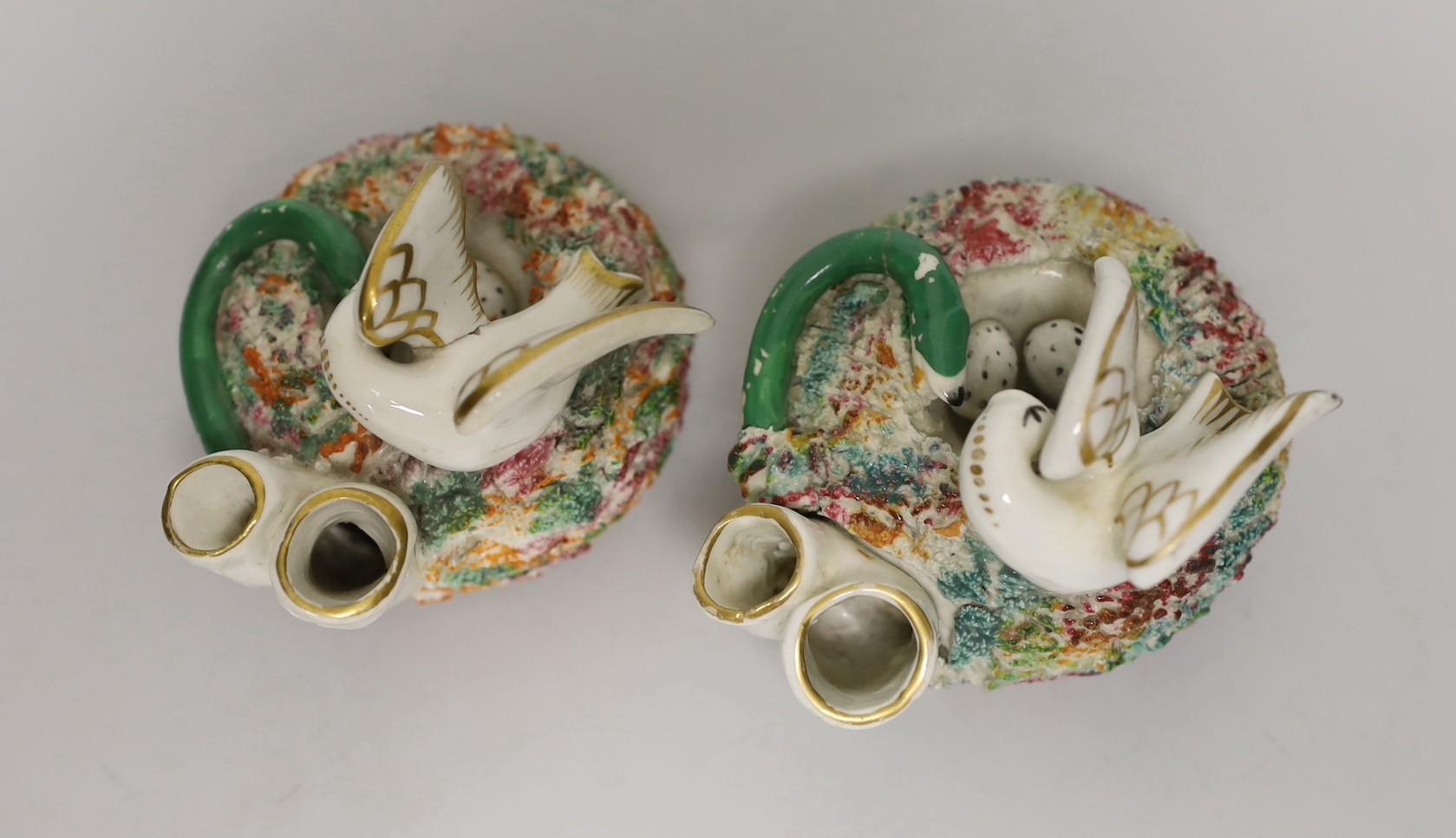 Two similar Staffordshire porcelain 'bird's nest' quill holders, c.1830-50